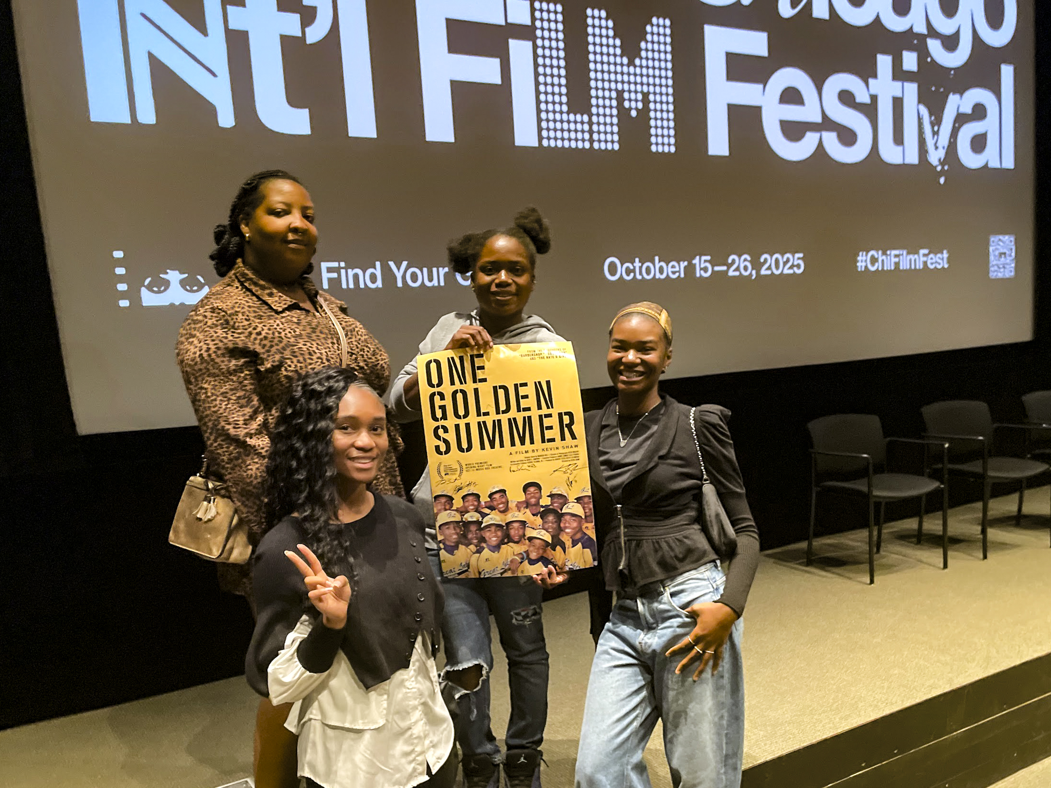 Young female filmmakers showing work at a film festival